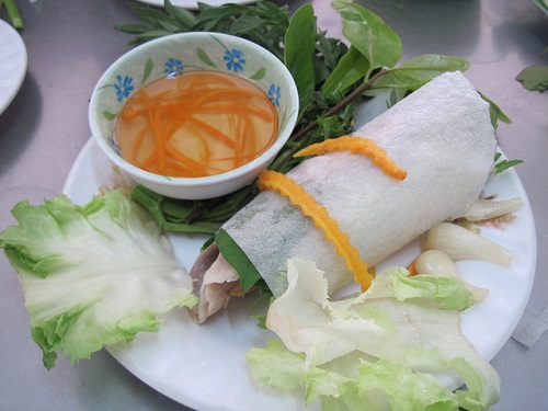 Boiled meat and vegetable rolled in Trang Bang rice paper