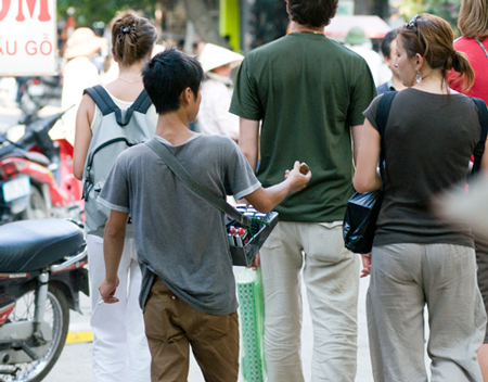 Tourists are tailed by hawker