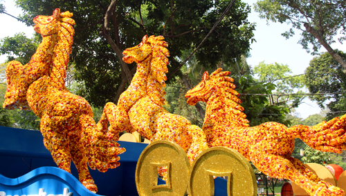 Three horses in spring flower festival